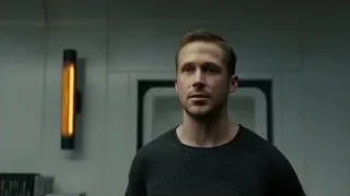 man in black sweater by orange light — Blade Runner 2049