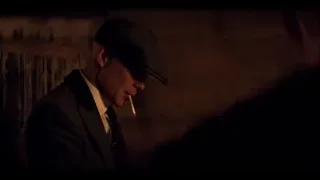 man smoking a cigarette in dark room — Peaky Blinders