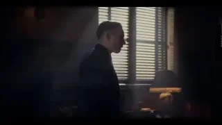 Man in dark suit by window with blinds — Peaky Blinders