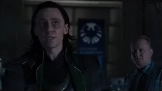 man in leather jacket in dim room — The Avengers