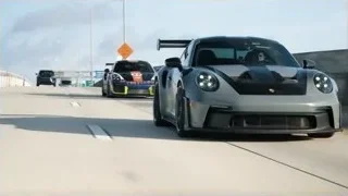 sports cars racing on track — Sports Cars