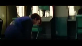 person kneeling arranging paper on tiled floor — Steve Jobs