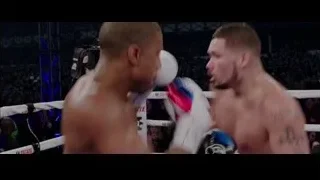 two boxers fighting in ring — Creed