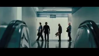 men walking in hallway with escalators — The Secret Life of Walter Mitty