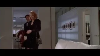 women sitting on white couch — American Psycho