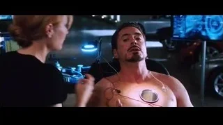 shirtless man with stethoscope and woman — Iron Man