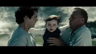 man standing on road with ominous clouds — Superman: Man of Steel
