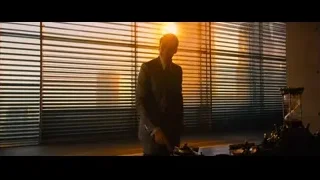man in suit at window with blinds — John Wick: Chapter 4
