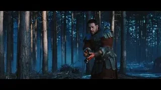 man holding sword in dark forest — Gladiator