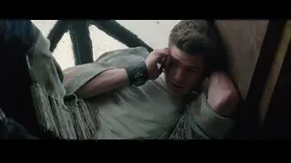 young man lying on bed in thought — The Amazing Spider Man 2