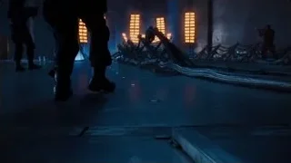 person walking in dark industrial room — The Avengers