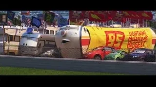 Lightning McQueen trailer and RVs parked — Cars 3