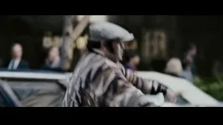 man in cap pointing on street — The Persuit of Happyness