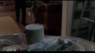 man standing in kitchen looking out window — Spider Man