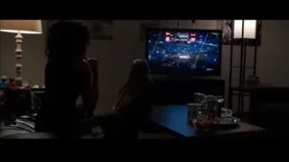 people watching TV on a couch — Southpaw
