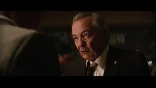 elderly man in suit with serious expression — Ford v Ferrari