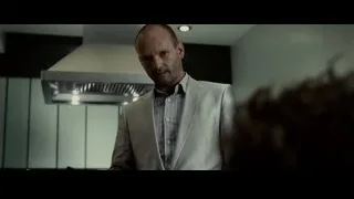 bald man looking down seriously — Limitless