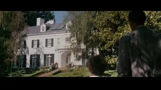 large white mansion with black roof — The Persuit of Happyness