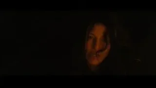 close-up of person's face in dark — Into the Wild