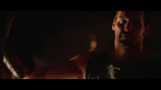 Shirtless man holding gun in a fight — Gladiator