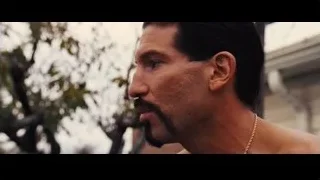 shirtless man with mustache outdoors — The Wolf Of Wall Street