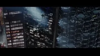 Futuristic cityscape at night with hexagonal structure — The Amazing Spider Man