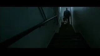 Man looking down at woman on staircase — Southpaw