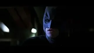 Batman face close-up wearing blue mask — Batman: The Dark Knight