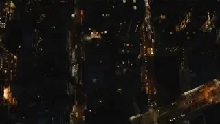 Aerial view of city skyscrapers at night — Succession