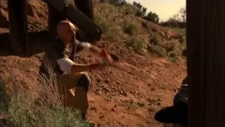 man sitting on dirt hillside — Breaking Bad