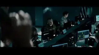 people working in dimly lit control room — Superman: Man of Steel