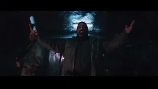 man with flashlight in dark cave — Iron Man