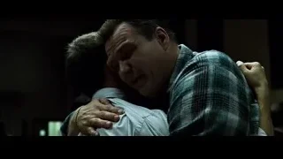 Two men embracing in dimly lit room — Fight Club