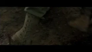 Person lying on ground covered in blood — Hacksaw Ridge