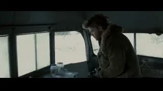 Person looking out snowy bus window — Into the Wild