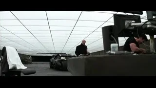 man working at desk — Batman: The Dark Knight