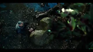 person crouching searching in forest — Jurassic World
