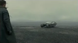 futuristic car in barren foggy landscape — Blade Runner 2049