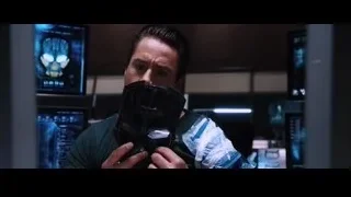 man wearing futuristic helmet in control room — Iron Man
