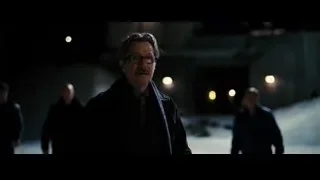 man with mustache and glasses smiling — Batman: The Dark Knight Rises