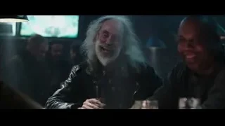 men laughing and smiling in bar — Deadpool