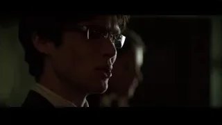 man's face looking in dim room — Batman