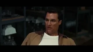 Man with serious expression in room with shelves — Interstellar