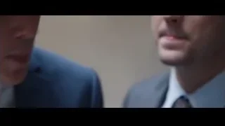 two men in tense conversation — The Big Short