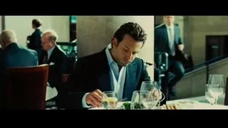 man sitting at table in restaurant — Limitless