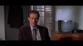 man sitting in office chair thoughtful — American Psycho
