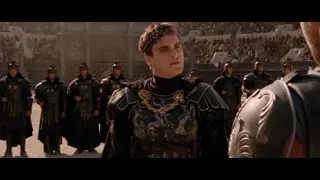 Young man in Roman armor addressing crowd — Gladiator