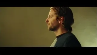 man with beard looking off — Limitless