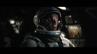 Man in space suit in cockpit — Interstellar