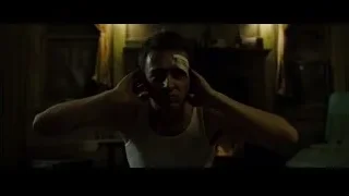 man covering eyes in cluttered room — Fight Club